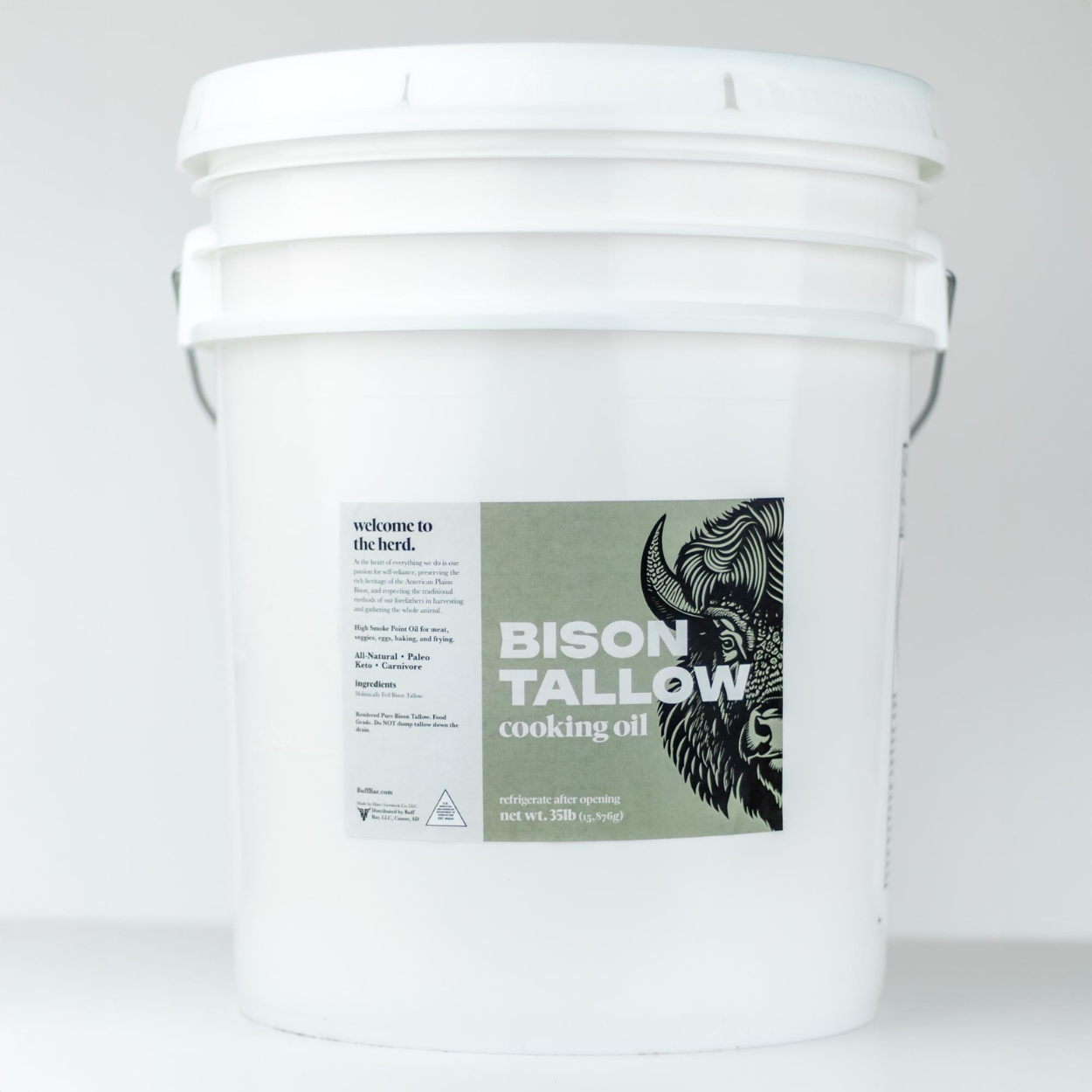 White bucket labeled 'Bison Tallow Cooking Oil' on a white background
