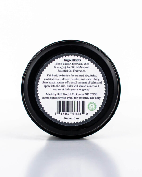 Buff Bar All-natural beard balm in a black glass with black lid and label featuring the Spice Barrell fragrance and the Buff Bar Bison illustration. The balm is on a white background.