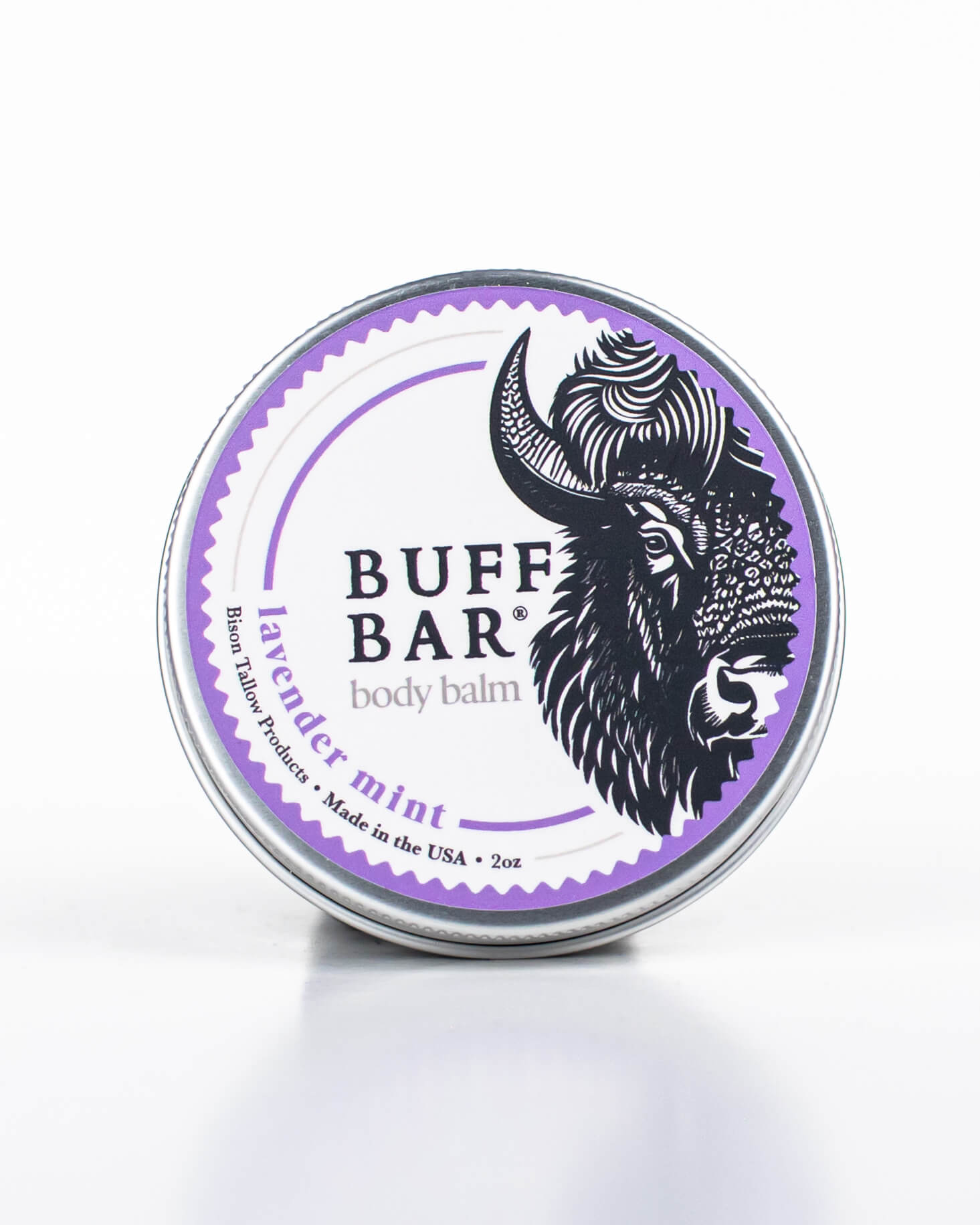 Buff Bar All-natural body balm in a tin and label featuring the Lavender Mint fragrance and the Buff Bar Bison illustration. The tin is on a white background.