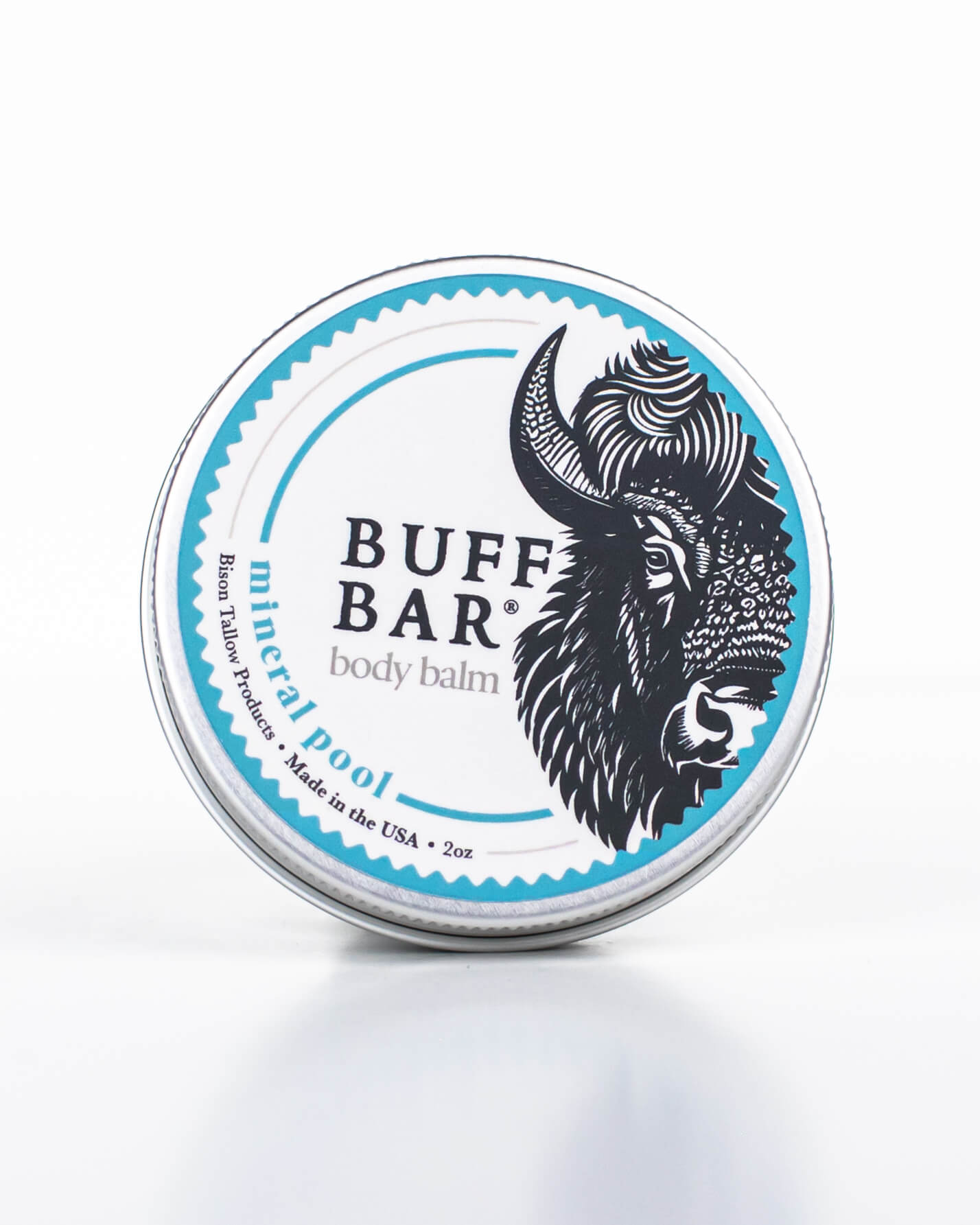 Buff Bar All-natural body balm in a tin and label featuring the Mineral Pool fragrance and the Buff Bar Bison illustration. The tin is on a white background.