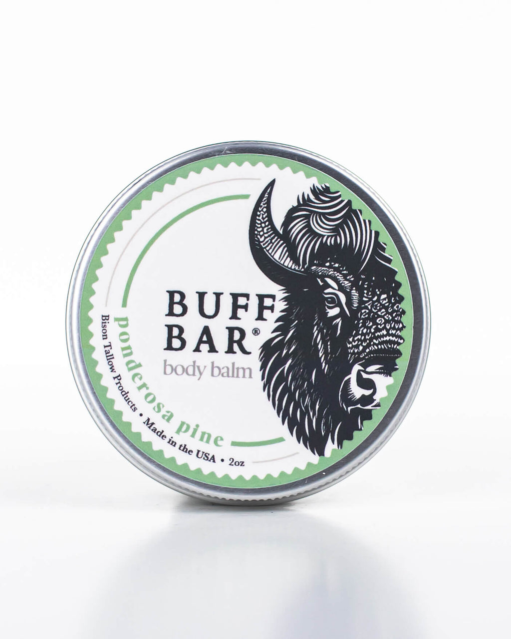 Buff Bar All-natural body balm in a tin and label featuring the Ponderosa Pine fragrance and the Buff Bar Bison illustration. The tin is on a white background.