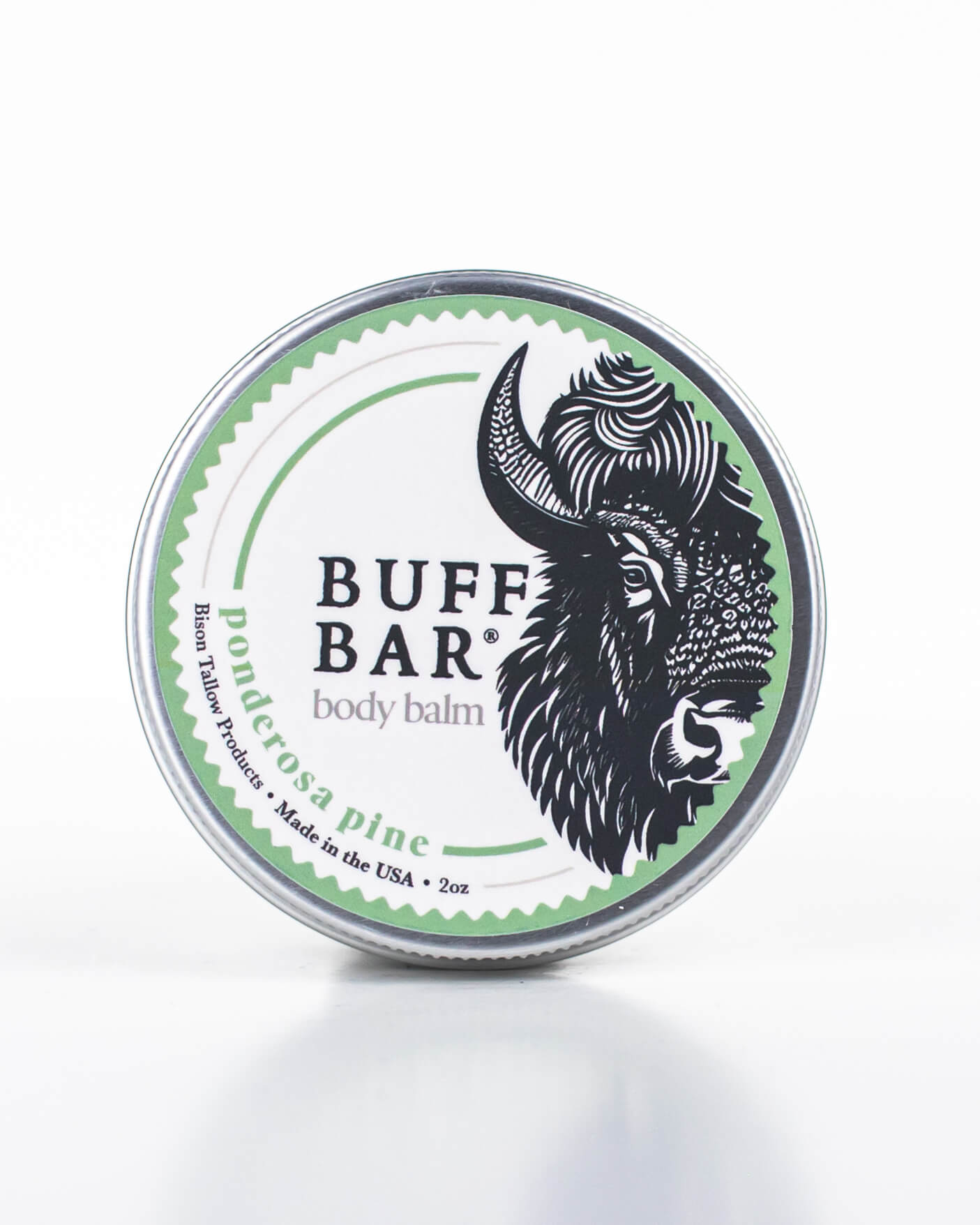 Buff Bar All-natural body balm in a tin and label featuring the Ponderosa Pine fragrance and the Buff Bar Bison illustration. The tin is on a white background.