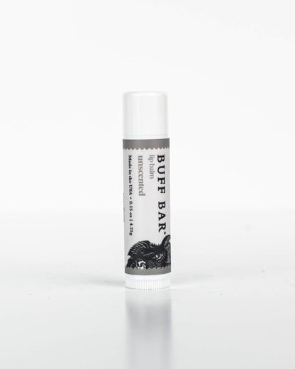 One tube of Buff Bar All-Natural lip balm featuring the Unscented Fragrance on a white background.