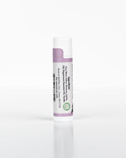 One tube of Buff Bar All-Natural lip balm featuring the Vanilla Peppermint Fragrance on a white background.