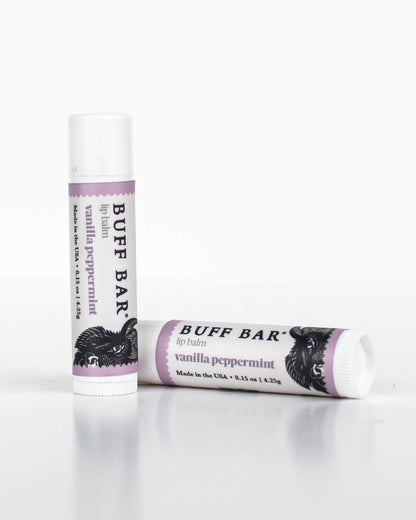 Two tubes of Buff Bar All-Natural lip balm featuring the Vanilla Peppermint Fragrance on a white background.